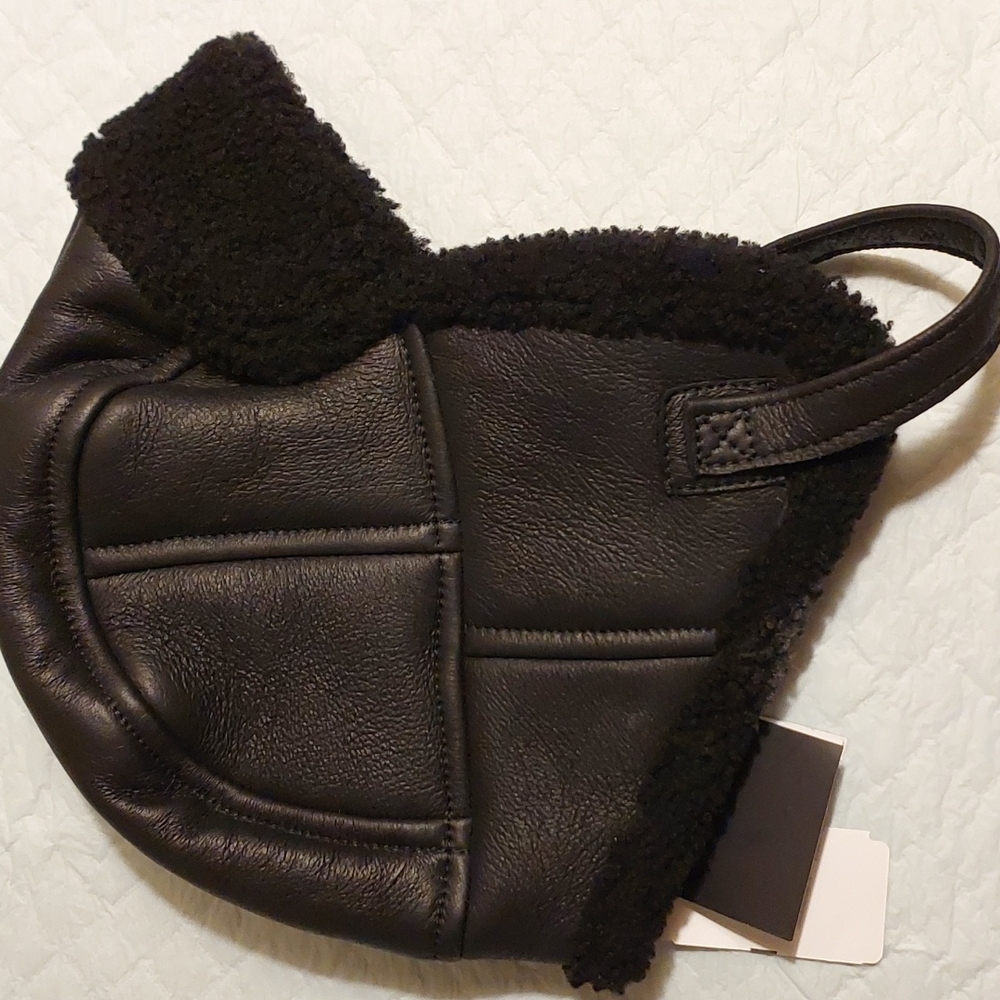 Shearling trapper hat. Tags No Longer Attached. Never Worn.